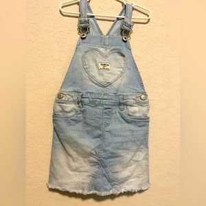 Girls Osh Kosh denim suspenders.